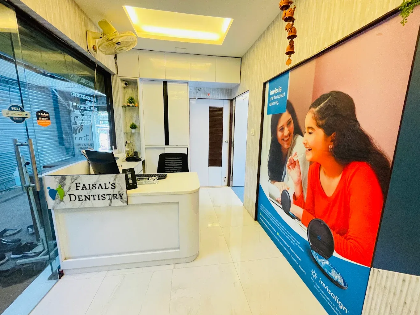 Image showing reception desk with clinic name