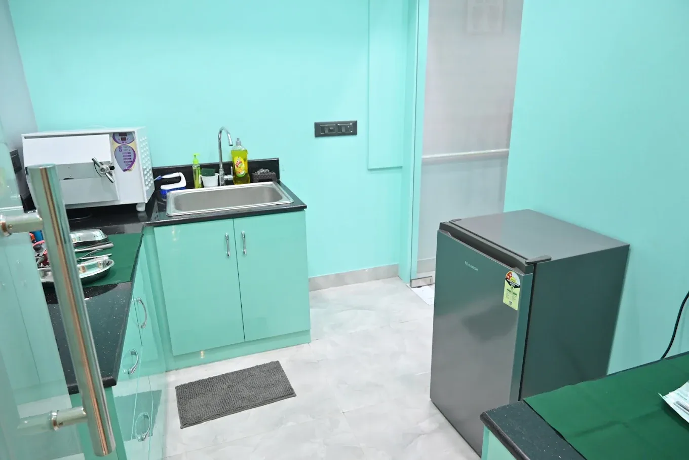 clinic work area showing a fridge