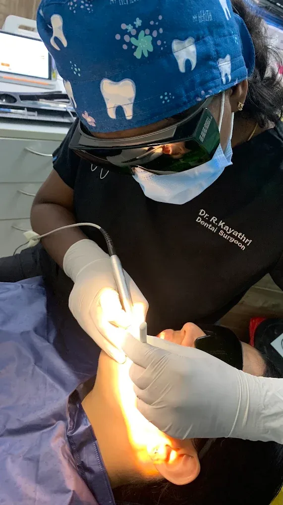 dentist performing treatment
