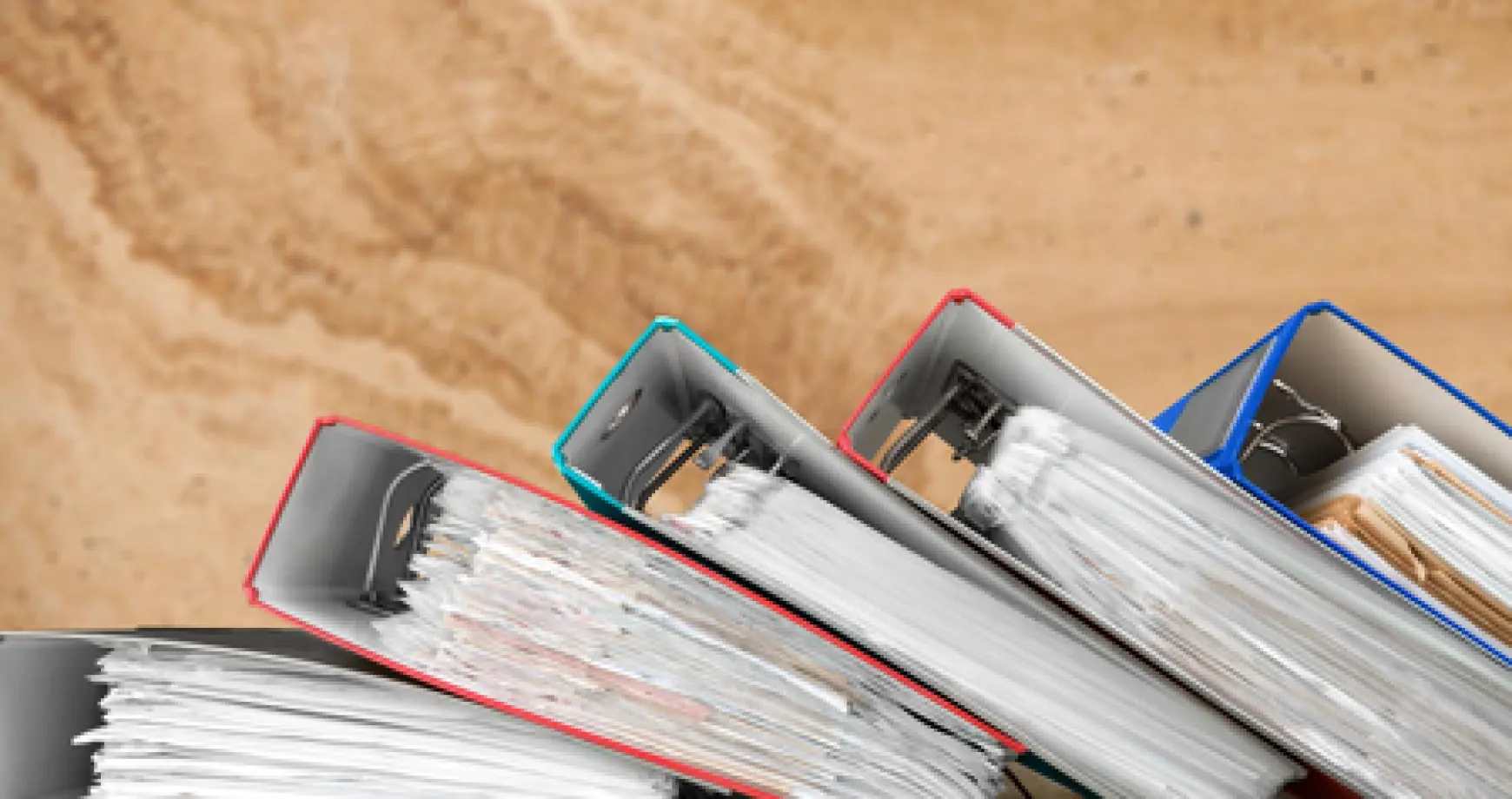 Manual dental patient records stacked up in a dental clinic